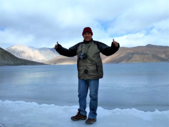 Standing firmly on frozen Pangong Lake